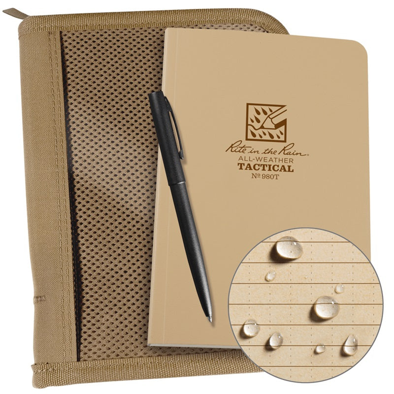 Rite in the Rain Land Nav Kit with tan cover, all-weather notebook, and metal pen for outdoor navigation.